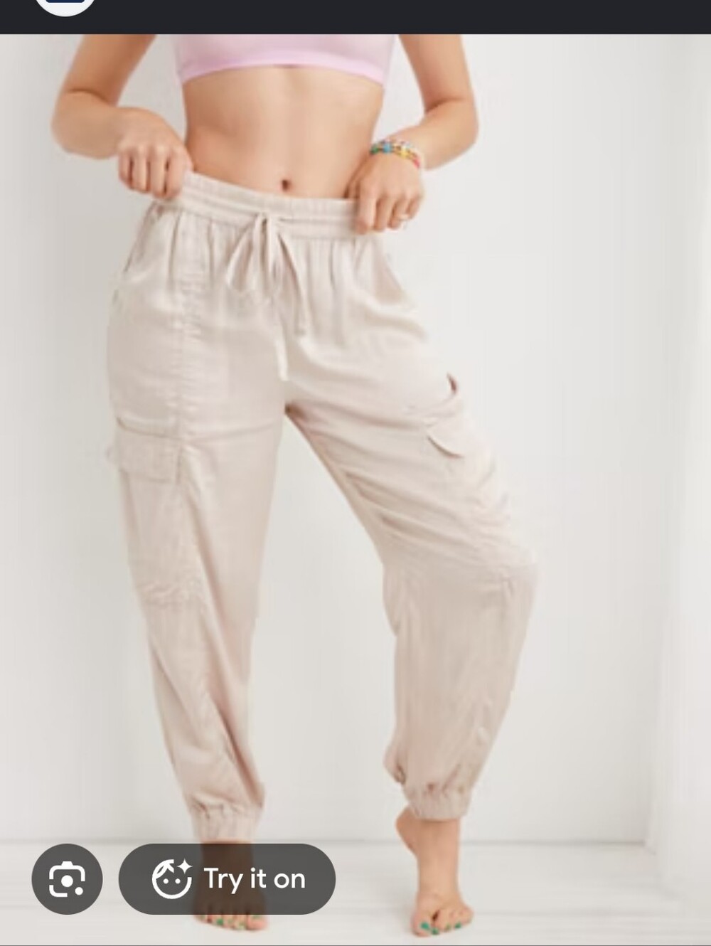 Aerie Satin Cargo Joggers in a dusty rose / light mauve shade.